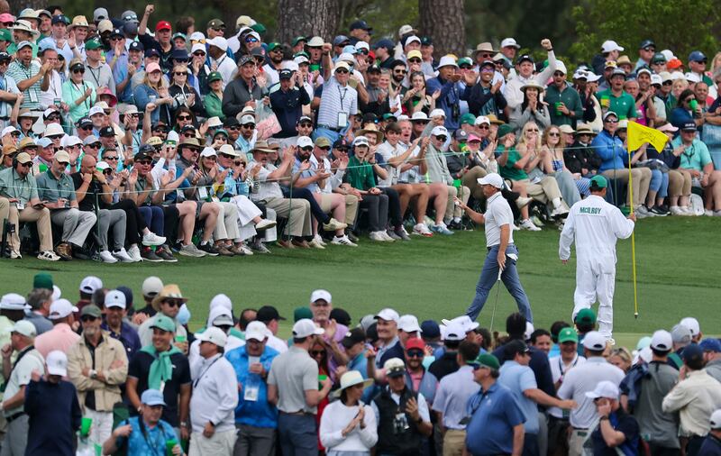 Rory McIlroy acknowledges the crowd on the third green during the third round of the 2025 Masters Tournament at Augusta National Golf Club. Photo: Michael Reaves/Getty Images