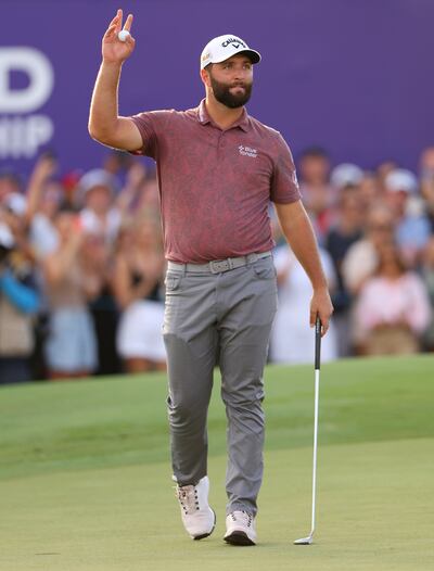 Jon Rahm of Spain celebrates winning DP World Tour Championship on the Earth Course at Jumeirah Golf Estates in Dubai. Photograph: Andrew Redington/Getty