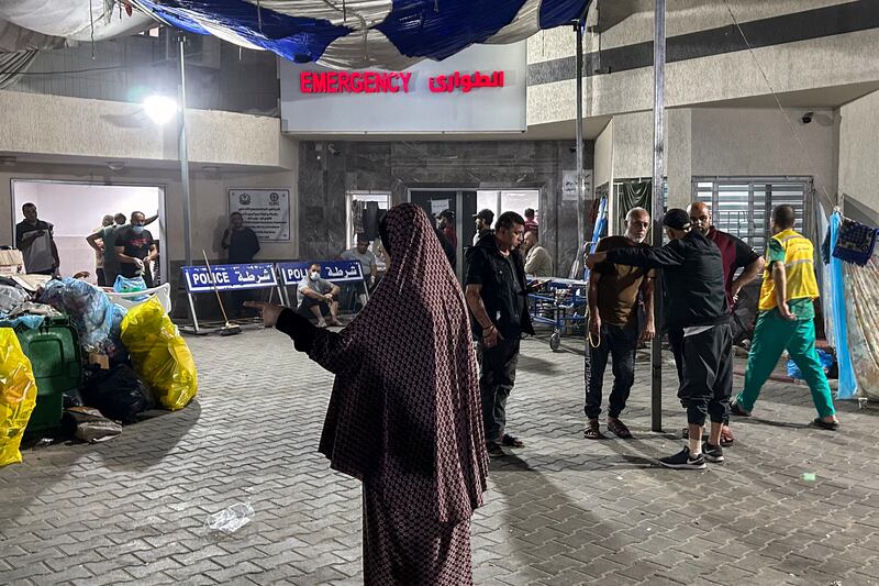 People stand outside the emergency ward of Al-Shifa hospital in Gaza City on November 10th. Photograph: Khader Al Zanoun/AFP via Getty