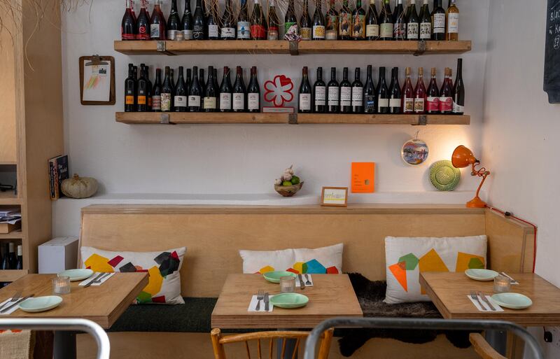 The walls of the small, nicely designed 15-seater Saint Francis Provisions are lined with bottles and other glassware. Photograph: John Allen