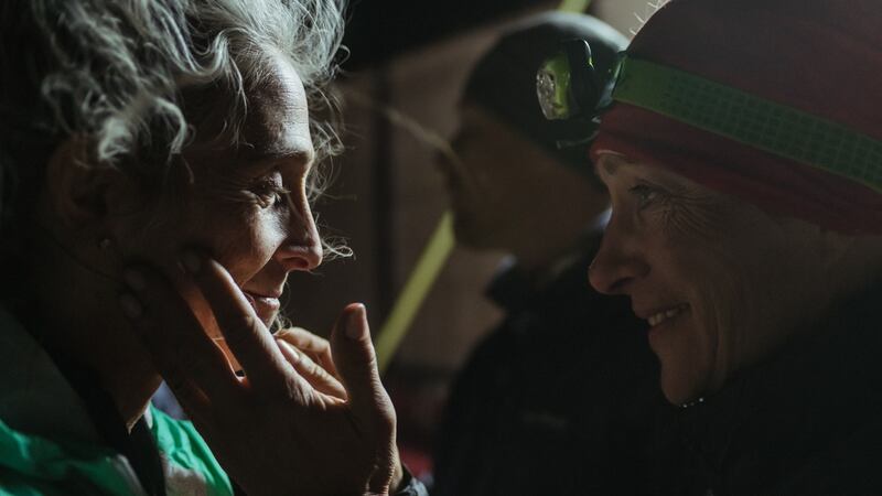 Amy Palmiero-Winters, left, talks to a fellow runner after finishing the Marathon des Sables.