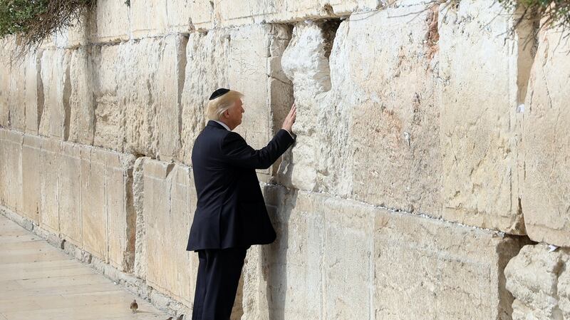 US president Donald Trump touches the Western Wall, Judaism’s holiest prayer site, in Jerusalem’s Old City, on  May 22nd, 2017. File photograph: Ronen Zvulun/EPA