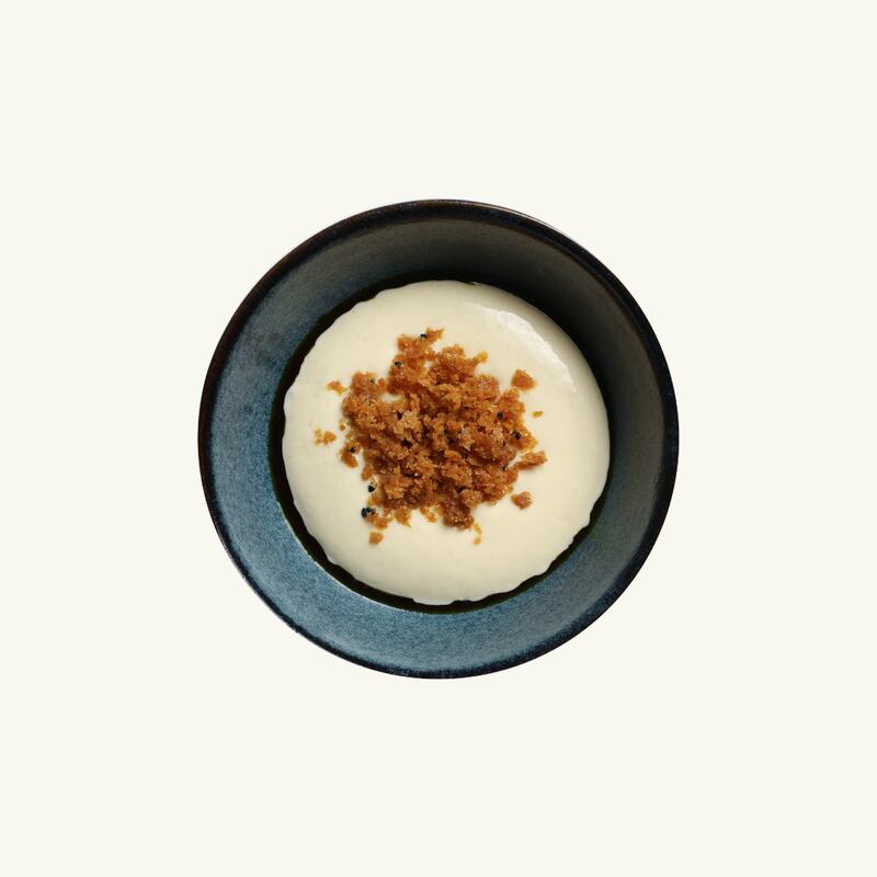 Chips and cheese: Parmesan espuma, curry oil and emulsion, crisp potato terrine.