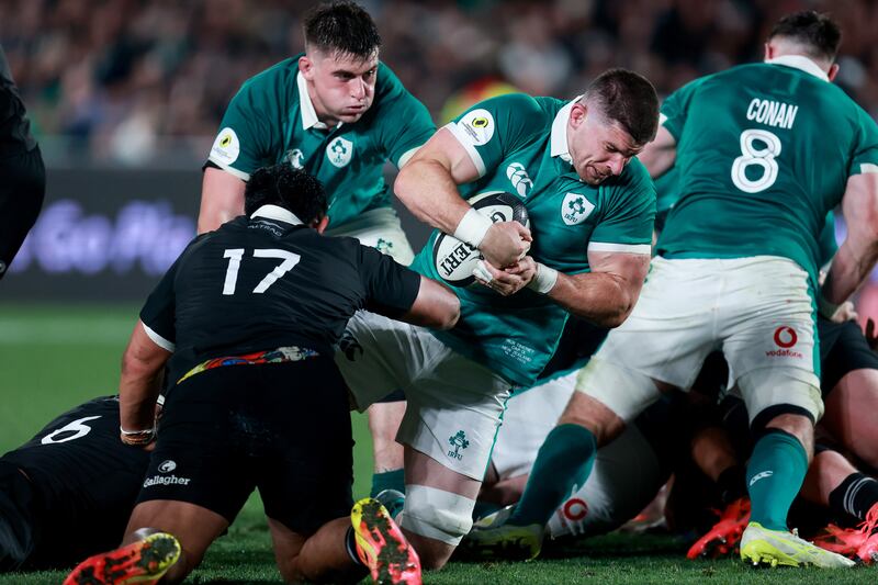 Ireland's Nick Timoney is tackled by Xavier Numia of New Zealand. Photograph: INPHO/Photosport/Craig Butland