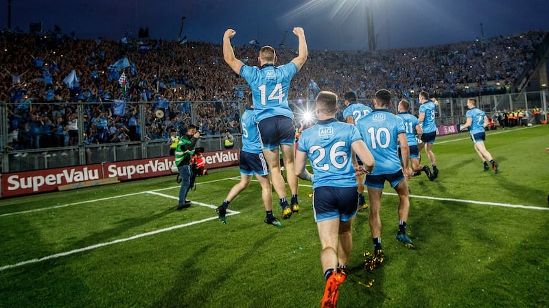The Dublin team celebrate in front of Hill 16 in Croke Park after beating Kerry in the All-Ireland senior football final replay. Photograph: Dara Mac Dónaill/The Irish Times