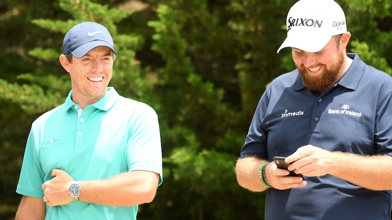McIlroy and Shane Lowry played a practice round together on Tuesday. Photo: Ross Kinnaird/Getty Images