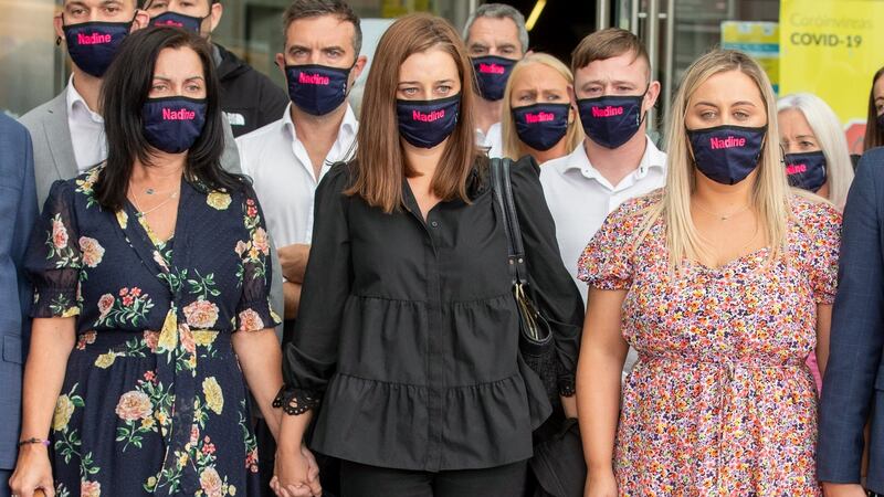 (Left to right) Claire Lott, Tanith Lott and Phoebe Lott, Nadine Lott’s  mother and sisters, are pictured  with other family members and friends  outside the Criminal Courts of Justice in Dublin following Daniel Murtagh’s conviction for Nadine’s murder. Photograph: Collins Courts.