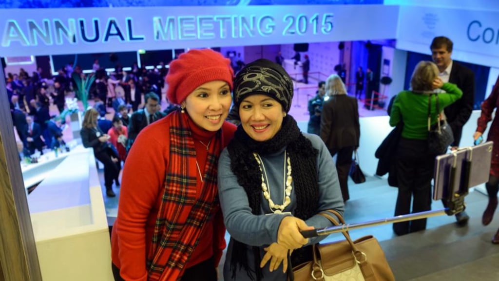 Davos selfie: attendees enjoy a lighter moment at the 45th annual meeting of the World Economic Forum. Photograph: EPA/Laurent Gillieron