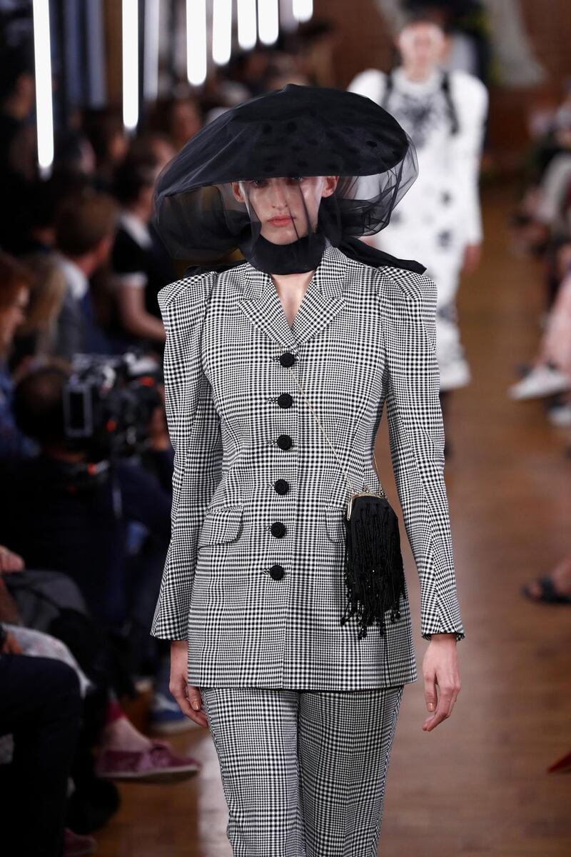 Erdem mixed wild and flouncy with sharper shapes, showing how veiling can dramatise a suit. Photograph:  Getty Images