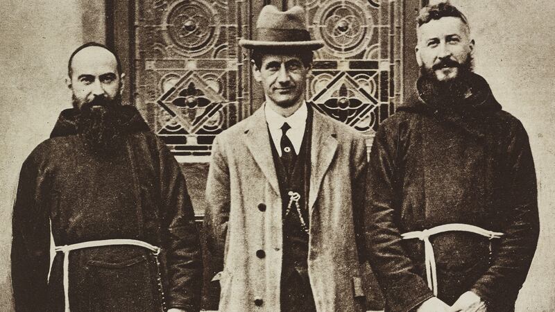 Terence James MacSwiney with two friars in October  1920. Photograph: De Agostini via Getty Images