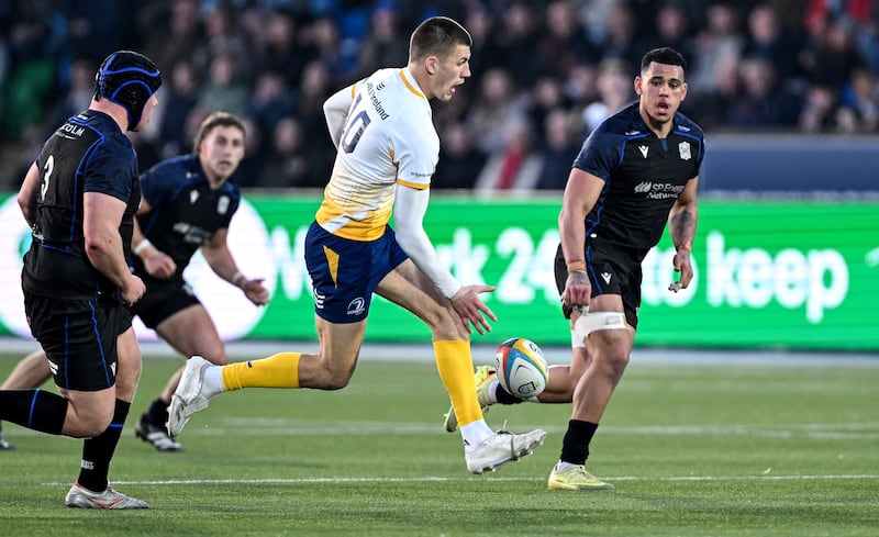 Leinster's Sam Prendergast chips the ball during the game against Glasgow. Photograph: Craig Watson/Inpho