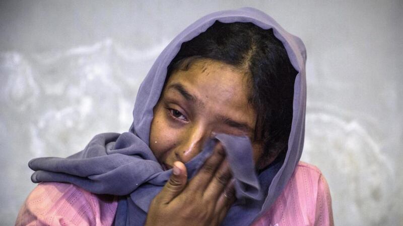 Humahai, a Rohingya migrant from Myanmar, in Lhok Sukon Sport Stadium, Sumatra, Indonesia, after being rescued from a drifting  boat off the North Aceh coast. Photograph: EPA/Zikri Maulana