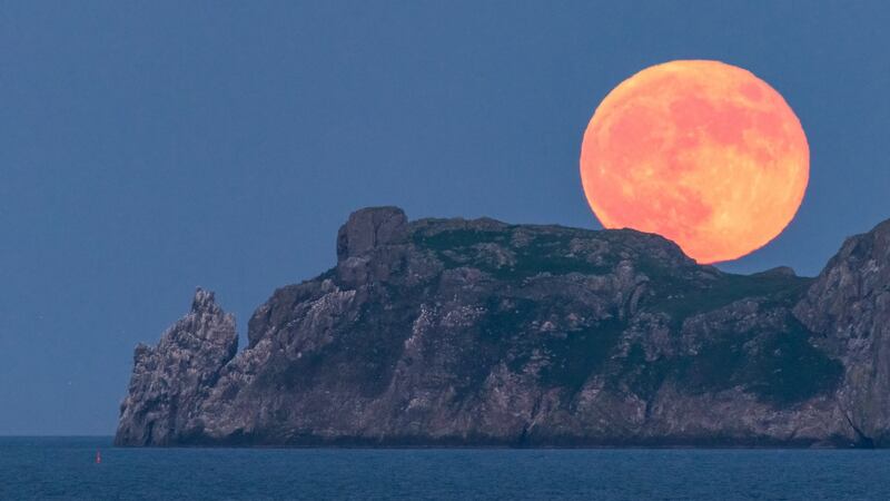 Last night’s  supermoon over Ireland’s Eye, off Howth Harbour in north Dublin. Photograph: David Behan