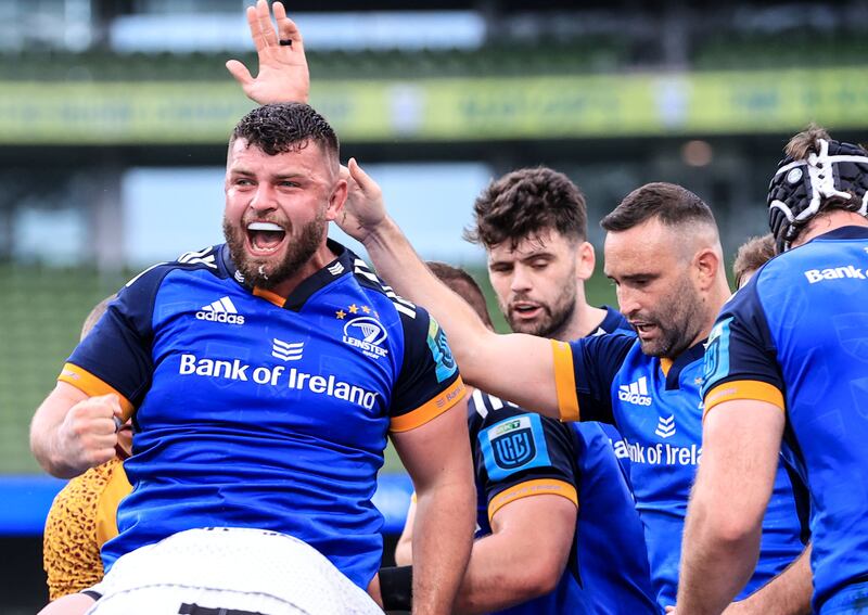 Leinster's Michael Milne and Leinster's Dave Kearney celebrate overcoming Sharks. Photograph: Dan Sheridan/Inpho