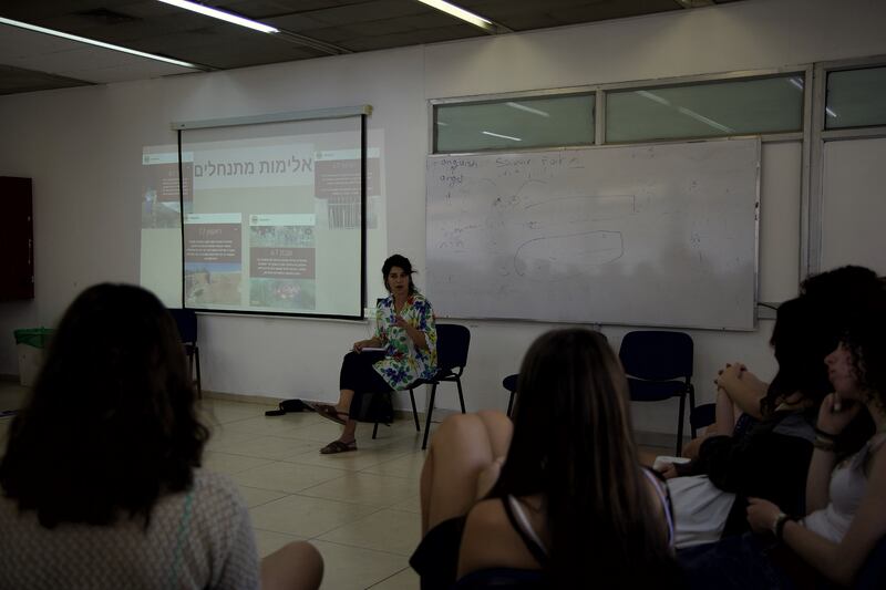 Israeli teenagers planning to take part in the Parents Circle summer camp discuss settler violence in Palestinian territories. Photograph: Hannah McCarthy