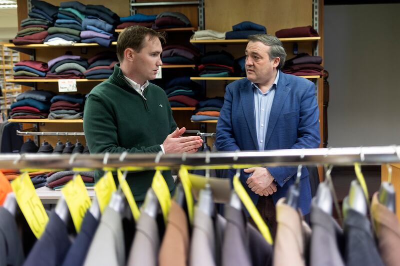 Independent presidential candidate Nick speaks with Fianna Fáil Councillor Marty McDermott at John Corcoran’s Menswear shop, in Roscommon. Chris Maddaloni
