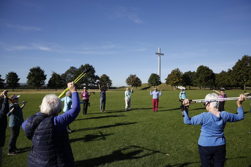 The Dublin Phoenix Nordic Walking Club warms up ahead of its two-hour walk through the park. Photograph Nick Bradshaw