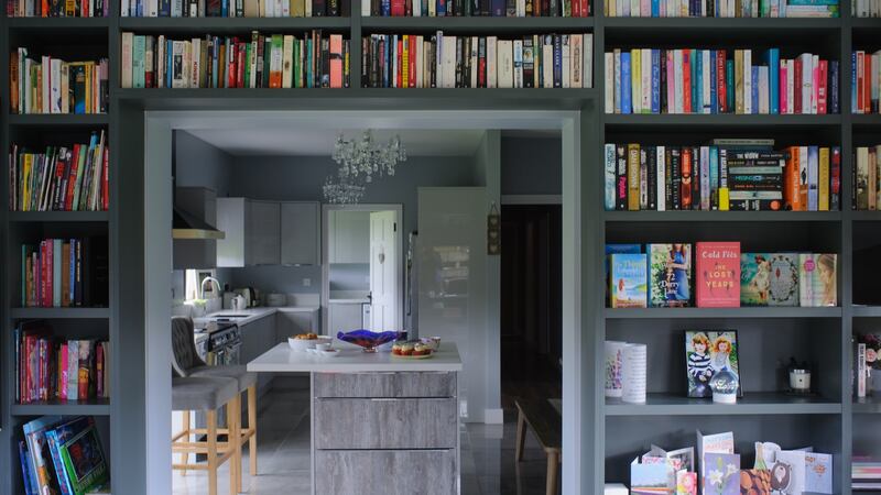 The library wall of Carmel Harrington’s home