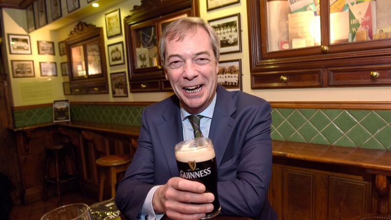 February 3rd: Nigel Farage enjoys a pint of Guinness in Crowe’s pub, Ballsbridge, after speaking at the Freedom to Prosper conference in the RDS. Photograph: Bryan Meade