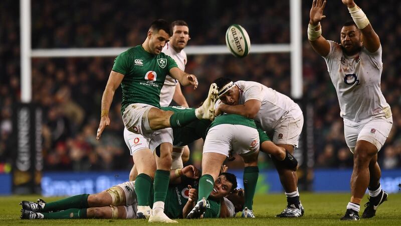 England’s Billy Vunipola attempts to block a kick from Ireland’s Conor Murray during the Six Nations game at  the Aviva stadium. Photograph: Clodagh Kilcoyne/Reuters