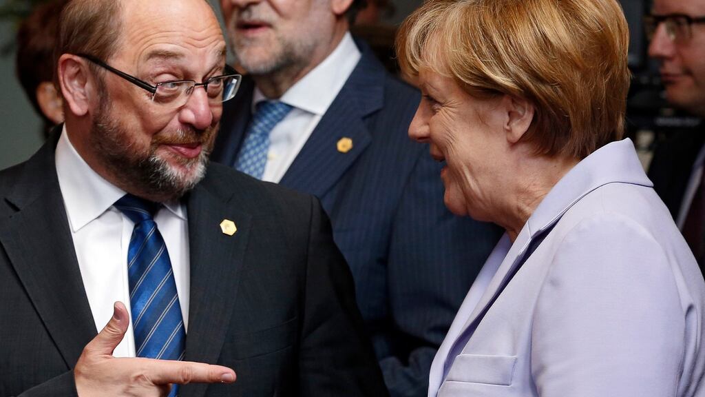Martin Schulz with Angela Merkel: The former European Parliament president has been proposed to replace Sigmar Gabriel as head of the SPD, best able to challenge the chancellor in Germany’s September elections. Photograph: EPA/Julien Warnand