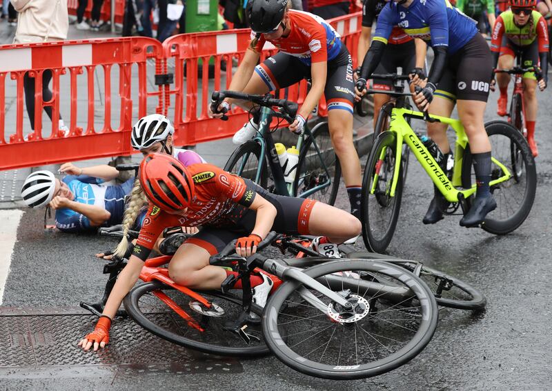 A crash takes place in the early stages of todays criterium stage. Photograph: Lorraine O'Sullivan