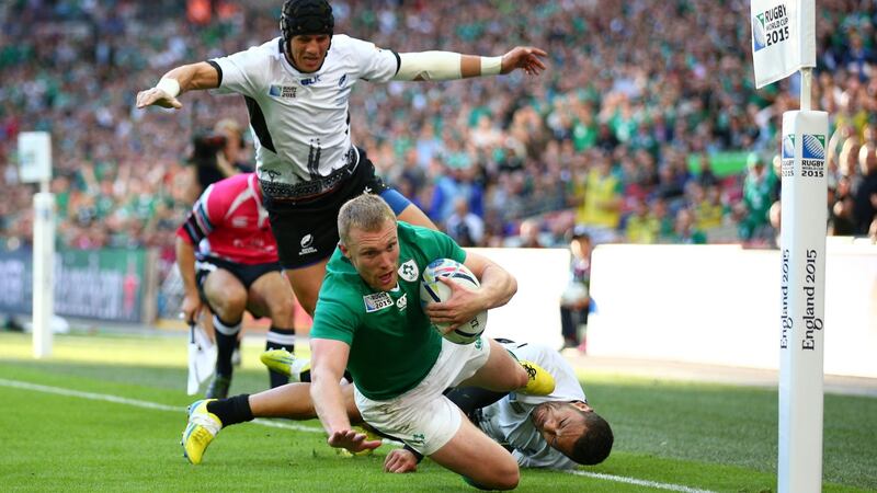 Keith Earls scores Ireland’s second try during their 44-10 defeat of Romania in 2015. Photograph: Paul Gilham/Getty Images
