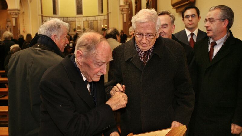 Former taoisigh Liam Cosgrave and Dr Garret FitzGerald sign a book of condolances at the removal service for  Dr Conor Cruise O’Brien in the Church of the Assumption Howth in  2008. Photograph: Matt Kavanagh