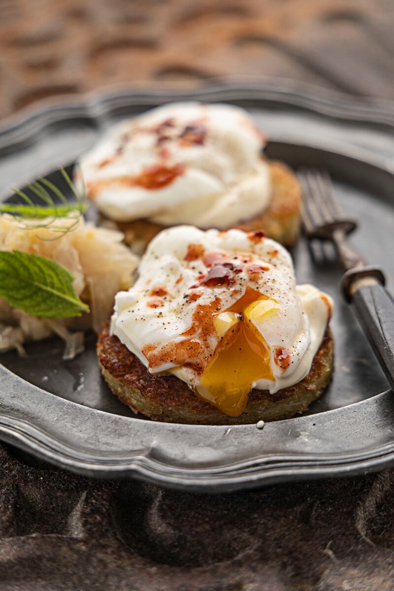 Potato and cabbage rosti with poached eggs. Photograph: Harry Weir