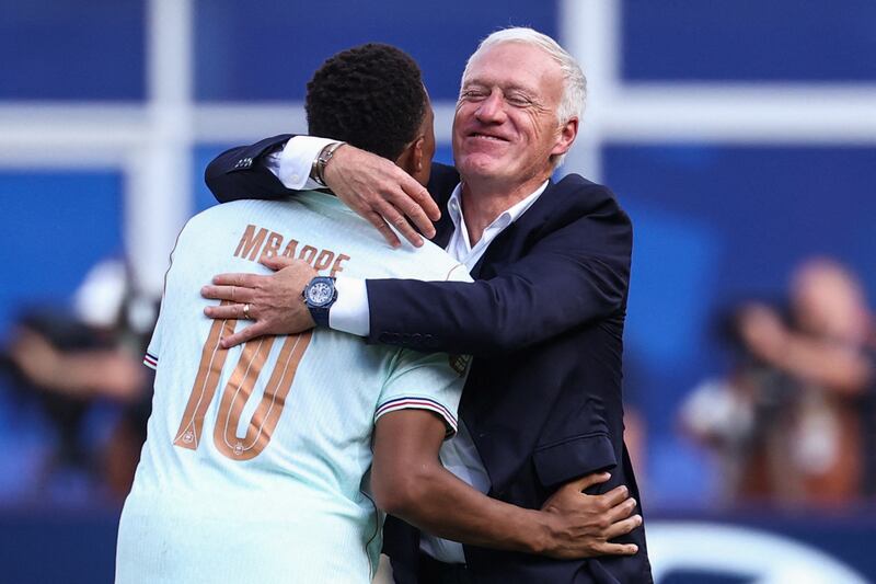 Striker Kylian Mbappé with head coach Didier Deschamps after France's World Cup quarter-final win over Morocco in Boston. Photograph: Franck Fife/AFP via Getty Images