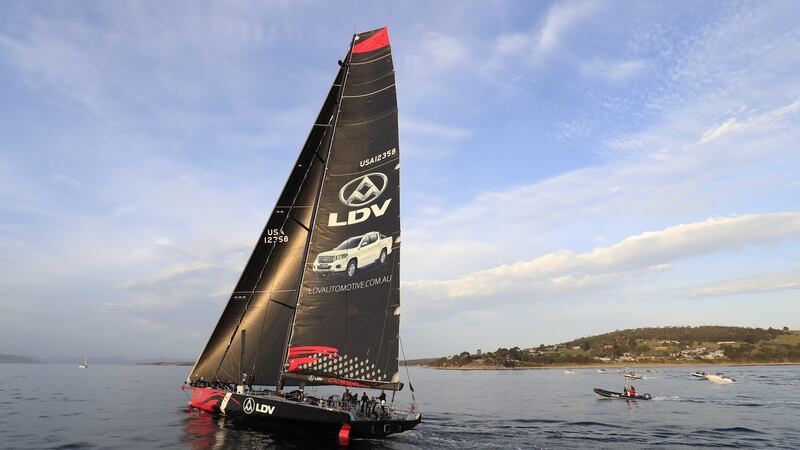LDV Comanche sails up the Derwent river towards the finish line of the 2017 Sydney to Hobart Yacht Race in Hobart, Tasmania. Photograph: Rob Blakers/EPA