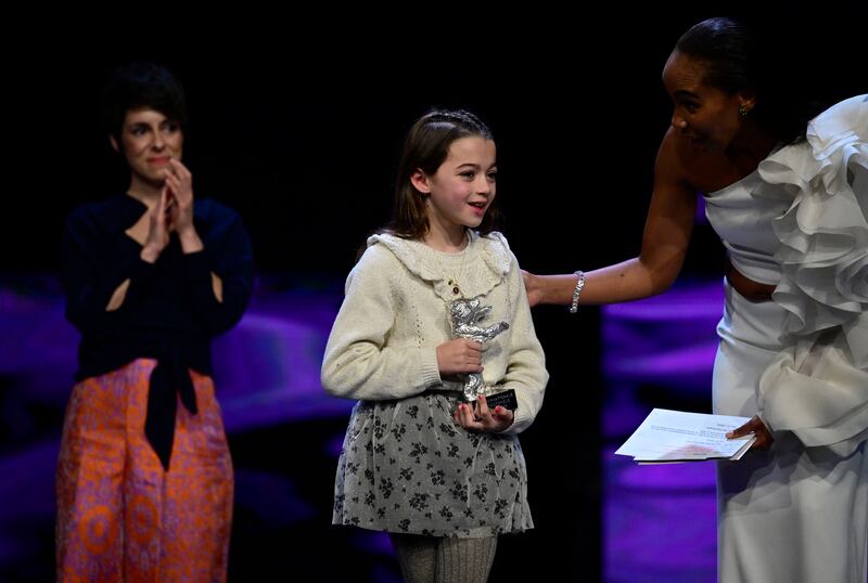 Silver Bear award: Estibaliz Urresola Solaguren applauds as Sofía Otero receives the award for best leading performance from German TV host Hadnet Tesfai at Berlin International Film Festival early this year. Photograph: John MacDougall/AFP/Getty
