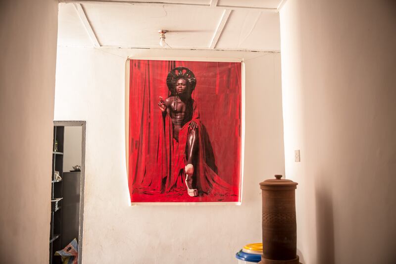 A portrait of Va-Bene Elikem Fiatsi hangs on the wall of her artists' residency. Photograph: Sally Hayden