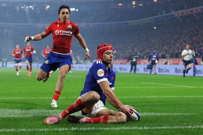 Louis Bielle-Biarrey of France scores his team's first try during the game against Italy in Lille on Sunday. Photograph: Getty Images