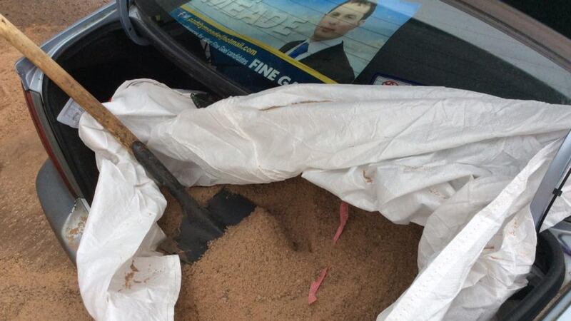 Cllr Paddy Meade’s car loaded with gritting salt which he has given to constituents