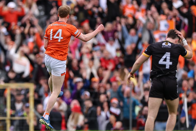 Armagh's Conor Turbitt jumps to celebrate after scoring his side's second goal. Photograph: Ben Brady/Inpho