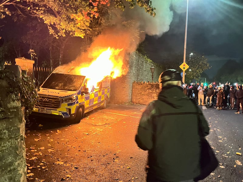 A Garda van was set alight during the unrest in Saggart on Tuesday night. Photograph: Ronan McGreevy
