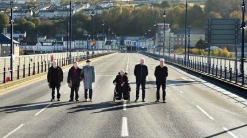 Fionnbarra Ó Dochartaigh (second from the left), with Trevor McBride, Dermie McClenaghan, Fionnbarra Ó Dochartaigh, Michael Canavan, Ivan Cooper,Terry Doherty and Aidan McKinney, recreating a photo from the civil rights movement on the Craigavon Bridge in 2018. Photograph: Freya McClements