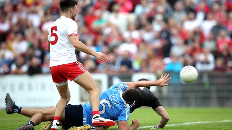James McCarthy scores Dublin’s first goal of the game past Niall Morgan of Tyrone at the All-Ireland SFC quarter-final  phase 2 at Healy Park, Omagh.  Photograph: Ryan Byrne/Inpho
