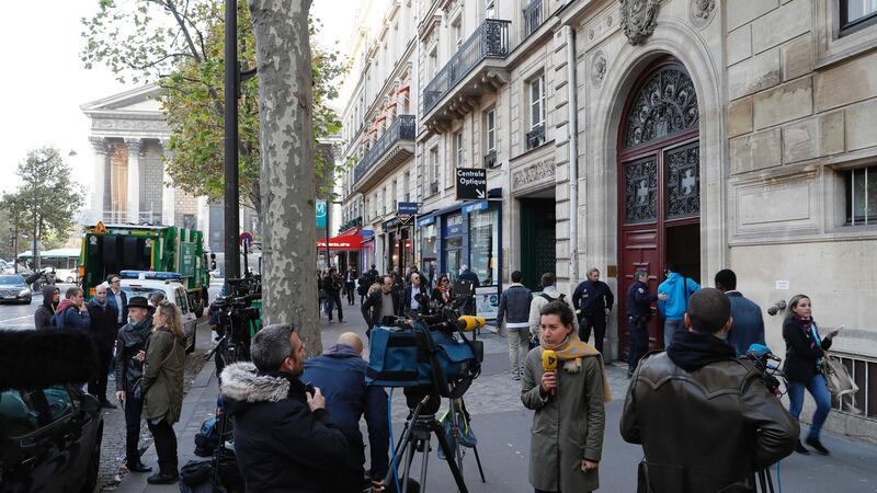 Journalists outside the  entrance to a  residence at the Rue Tronchet, near Madeleine, central Paris, on Monday, where US reality television star Kim Kardashian was robbed at gunpoint. Photograph: AFP