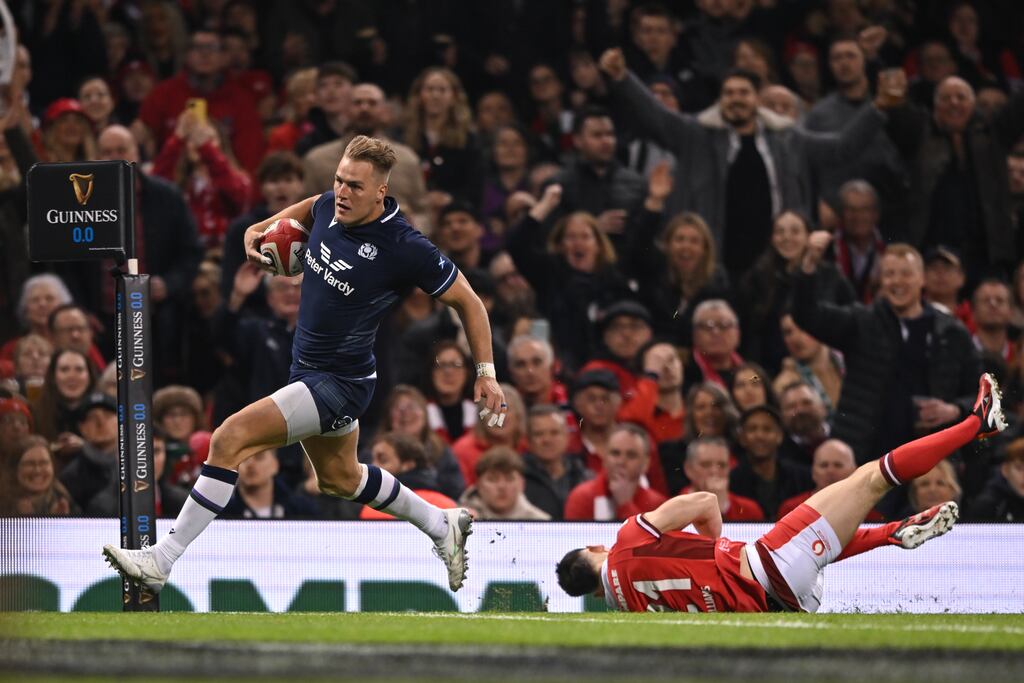 Duhan van der Merwe of Scotland scores his side’s third try. Photograph: Ashley Crowden/Inpho