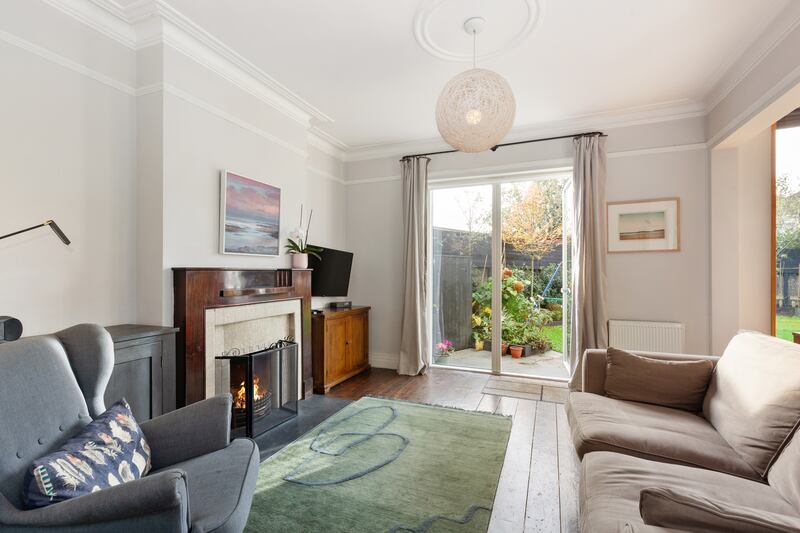 One of the reception rooms opens out to the rear garden