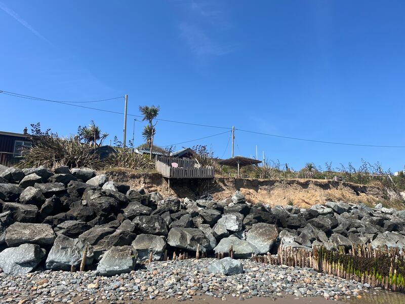 A balcony droops over rock revetments placed on the beach at Rosslare Strand. Photograph: Steven Carroll