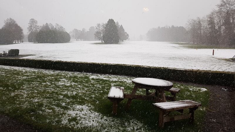 Snow falling at Tipperary Golf Club on Sunday. Photograph: Paula Hickey