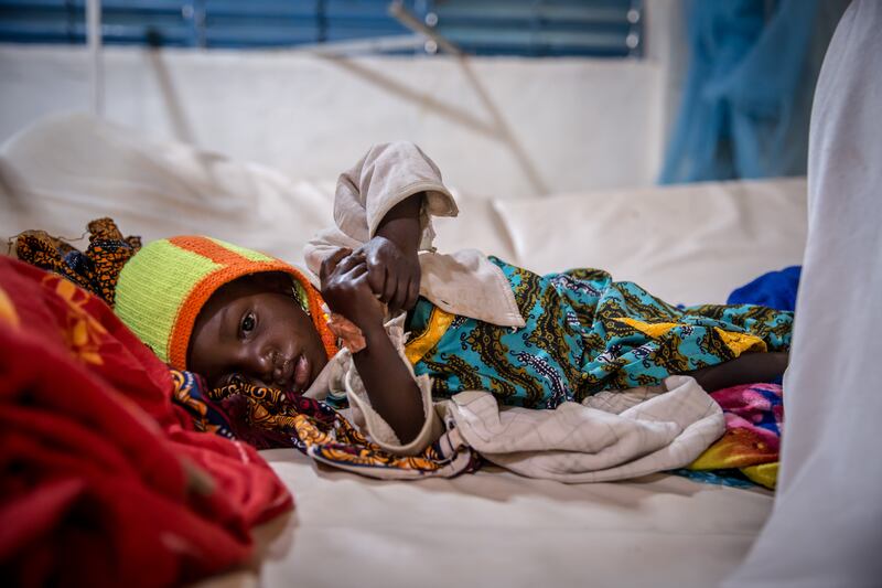 A child is treated for malnutrition in the intensive care room of a hospital stabilisation centre in Aguié. Photograph: Sally Hayden