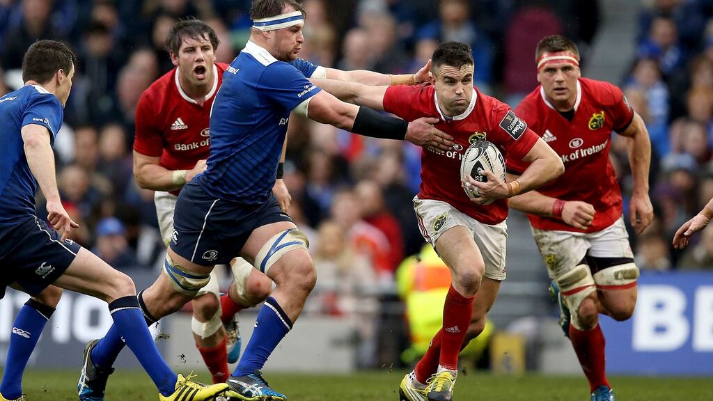 Leinster’s Rhys Ruddock tries to curtail Conor Murray at the Aviva Stadium. Photograph: Dan Sheridan/Inpho