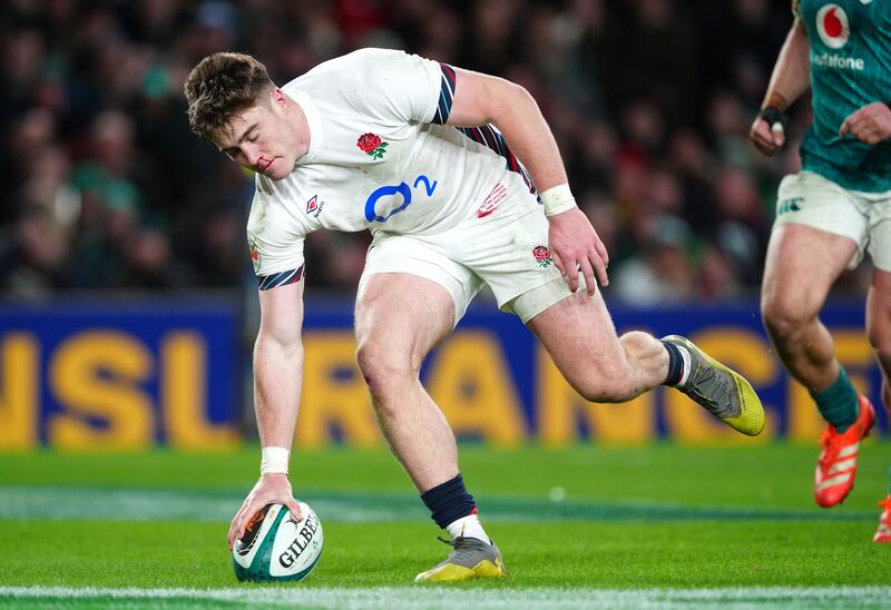 England's Tommy Freeman scores his side's third try of the game. Photograph: Brian Lawless/PA Wire