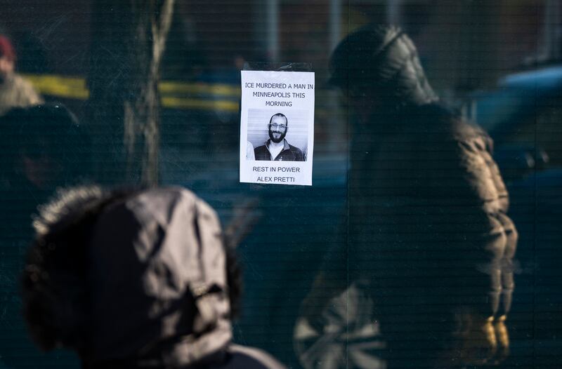 A person passes a poster of Alex Pretti in Minneapolis, Minnesota on Sunday. Photograph: Stephen Maturen/Getty Images
