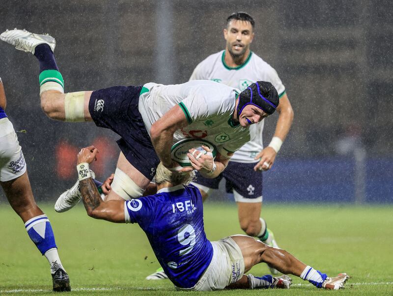 Samoa's Jonathan Taumateine stops Ryan Baird in his tracks. Photograph: Dan Sheridan/Inpho