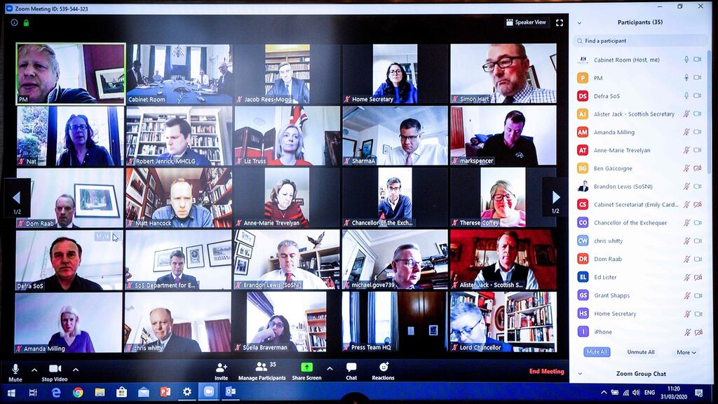 A screen relaying a Zoom video conference with UK prime minister Boris Johnson chairing a remote session with cabinet ministers while self-isolating. Photograph: Pippa Fowles/10 Downing Street/AFP via Getty